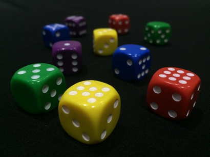 An assortment of dice of various colours